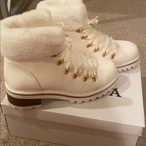 White and gold fur boots